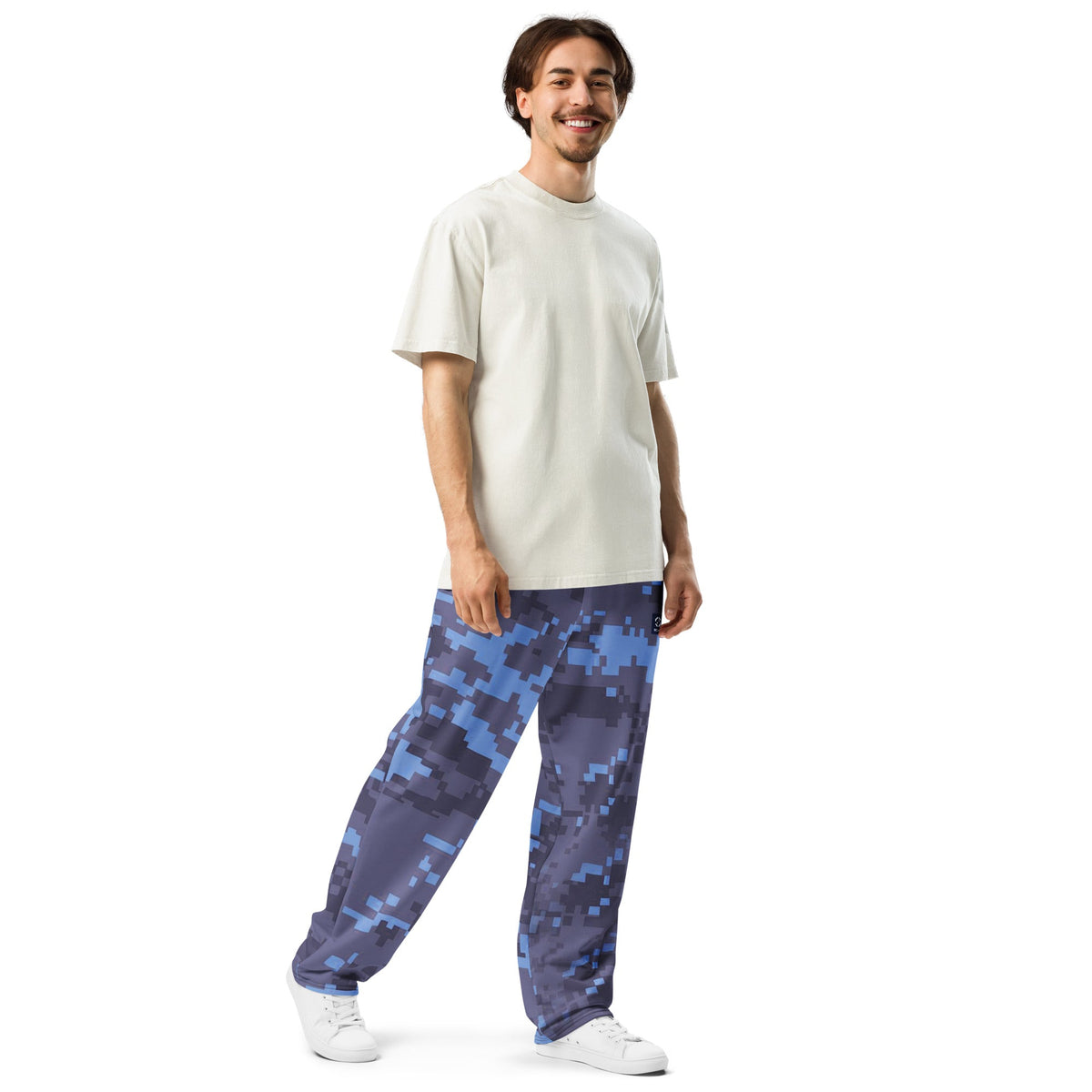 Digital camouflage wide-leg joggers with cuffed hems, elastic waistband and drawstring