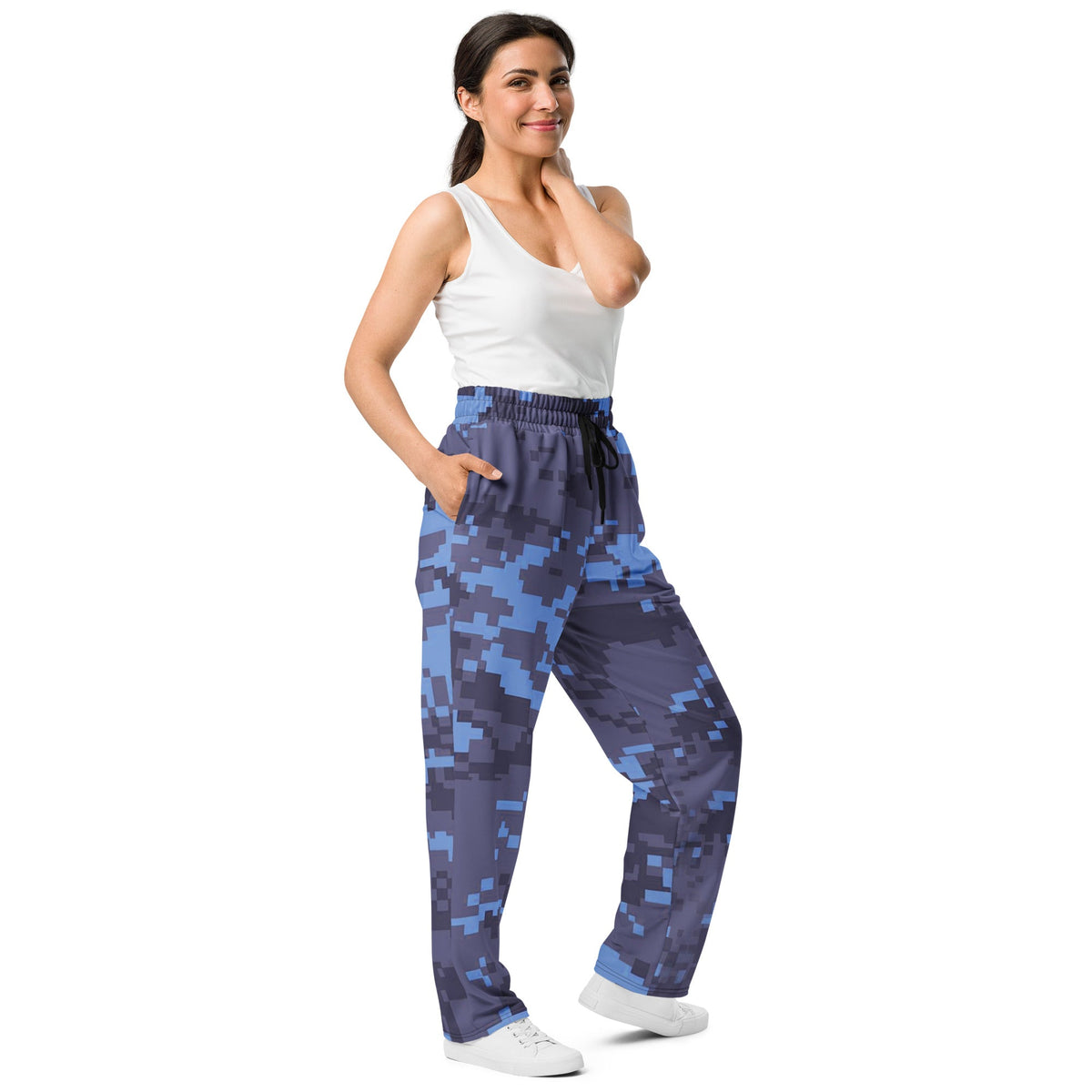 Digital camouflage wide-leg joggers on model, elastic waist with drawstring and side pockets