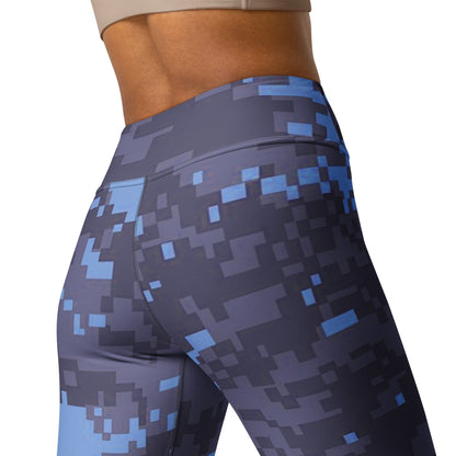 Close-up of navy digital camo yoga leggings with blue-gray geometric block pattern