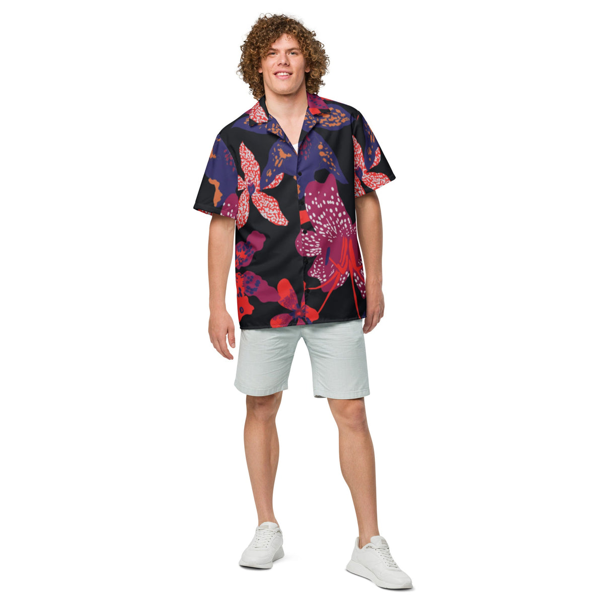 Unisex short-sleeve button-up shirt with dark floral print, full body on model