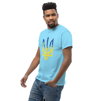 Light blue T-shirt with blue and yellow trident-style emblem graphic on chest