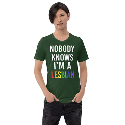 Forest green T-shirt with white stacked text and red “LESBIAN” graphic