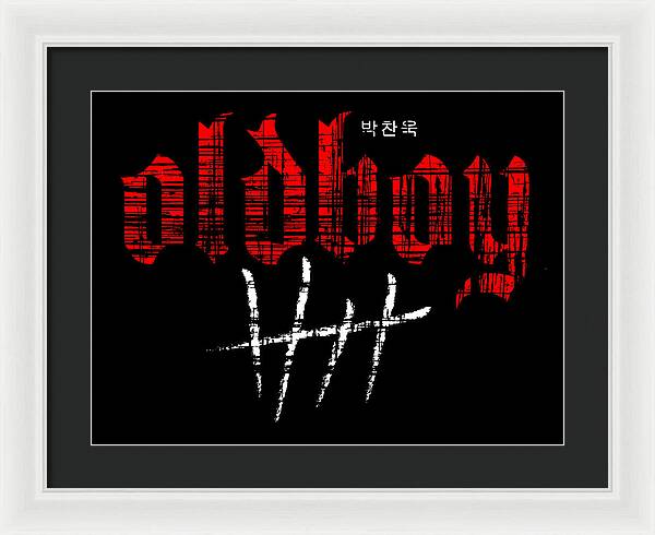 Framed print with dark mat and white frame; red and white city text graphic on black