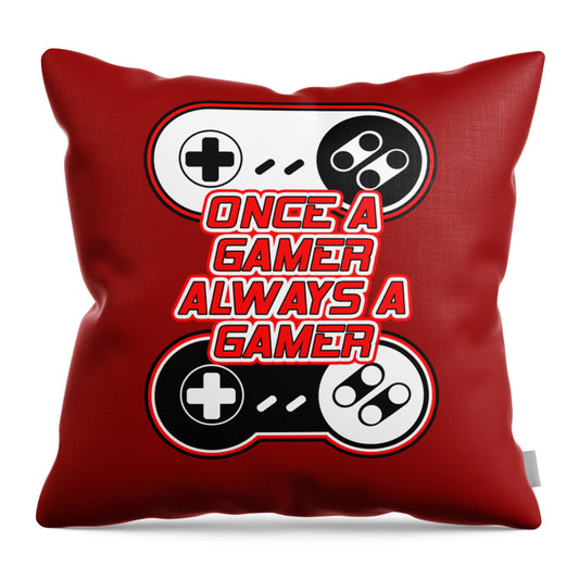 Red throw pillow with gaming controller graphic and 'Once a Gamer' wording