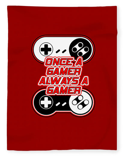 Red gaming blanket with controller icons and neon "Once a Gamer Always a Gamer" text