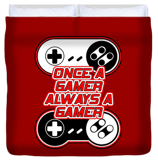 Red duvet cover with gaming controller graphic and bold slogan in red, white, and black.