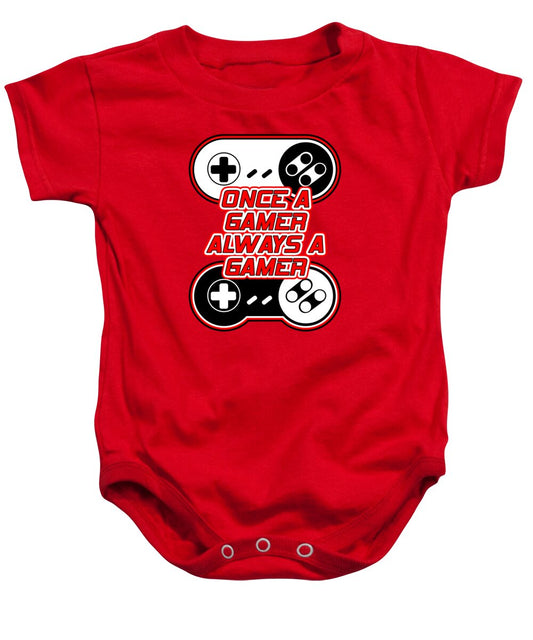 Red baby onesie with gaming controller graphic and slogan on front