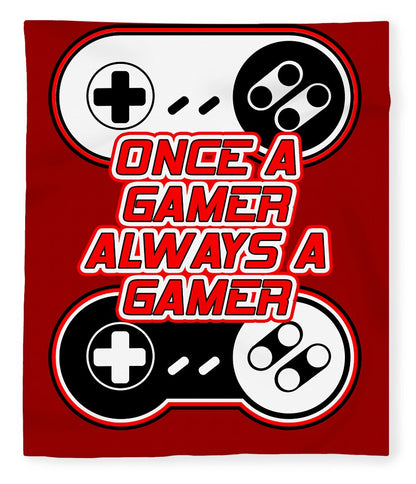 Red gaming blanket with controller icons and text "Once a Gamer, Always a Gamer"