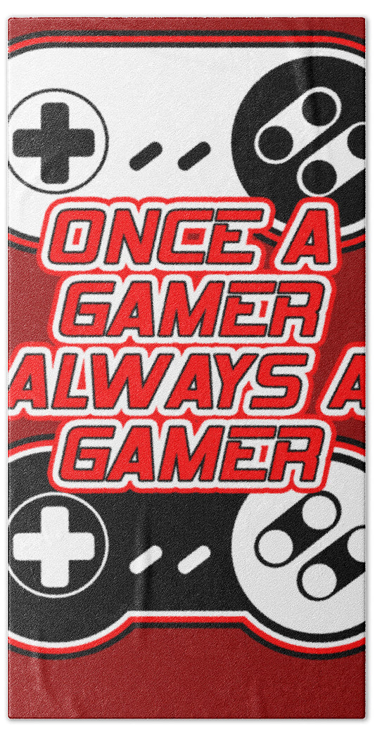 Gamer-themed bath towel with red and black controller graphics and game text