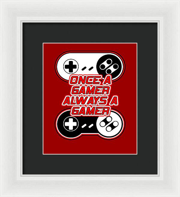 White-framed gamer print with black mat, controller icons, and 'Once a Gamer Always a Gamer'.