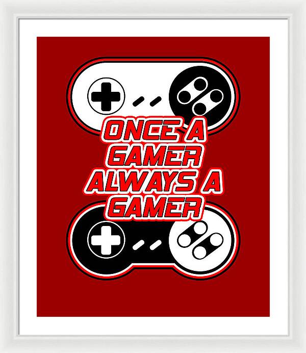 White framed gaming quote print with red background, controller icons, and text 'ONCE A GAMER ALWAYS A GAMER'.