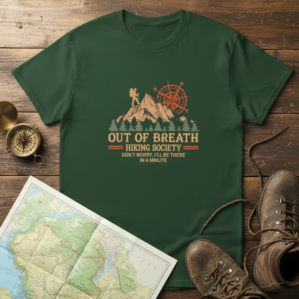 Forest green hiking graphic T-shirt with mountain cabin and compass emblem, crew neck