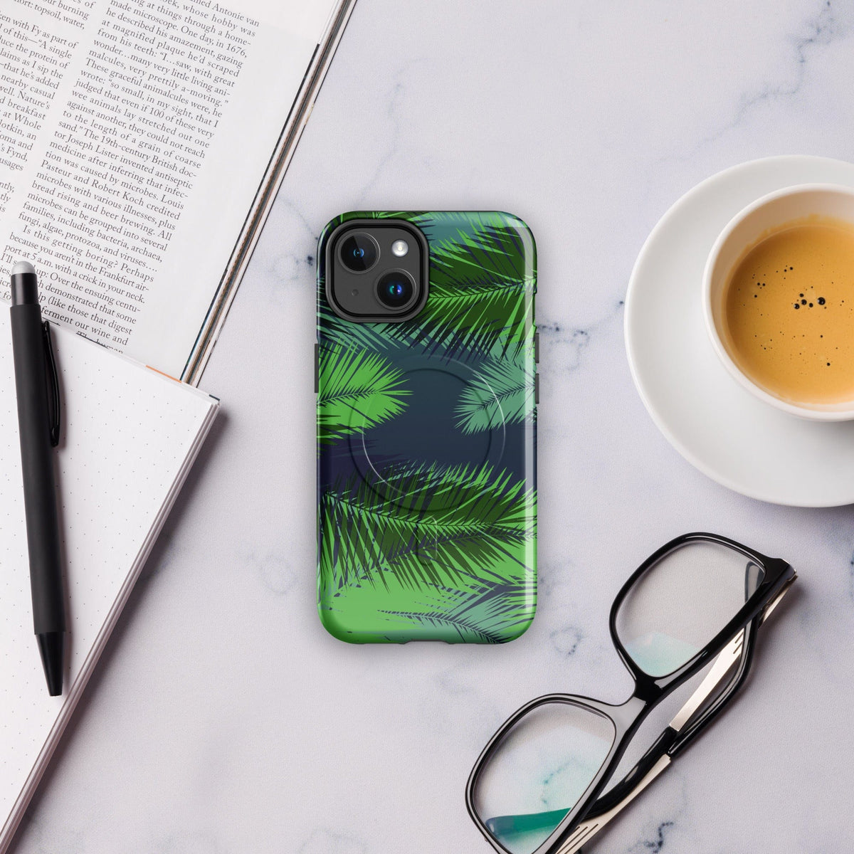 Tropical phone case with green palm leaves pattern and raised camera area