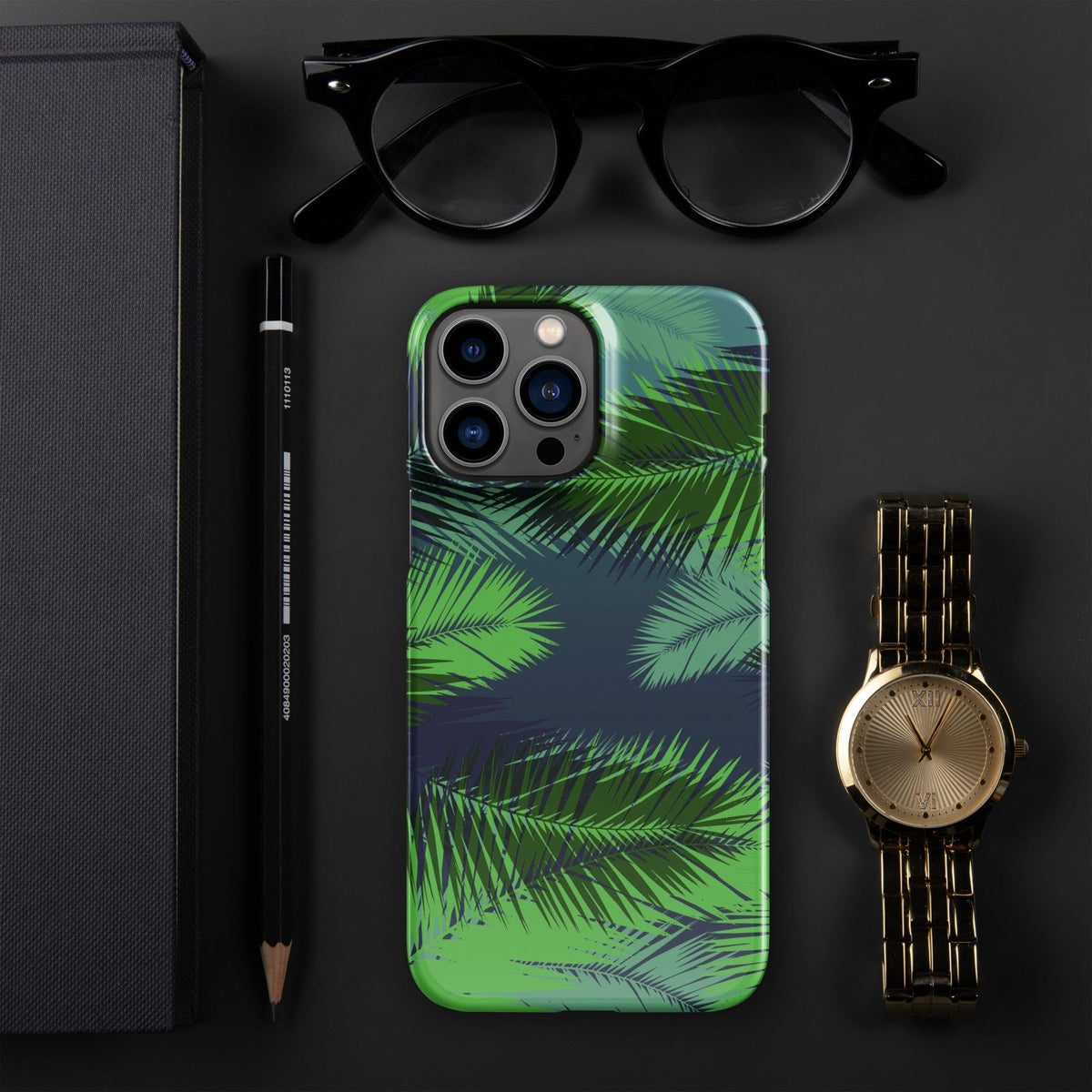 Palm leaf printed iPhone snap case, glossy back with camera cutouts.