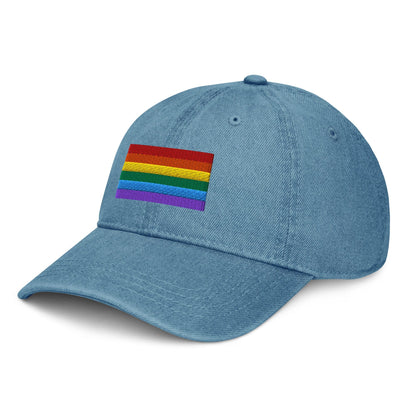 Light blue denim baseball cap with rainbow pride flag patch embroidered on front