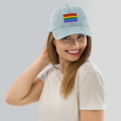 Light blue denim baseball cap with Pride rainbow flag embroidery on the front