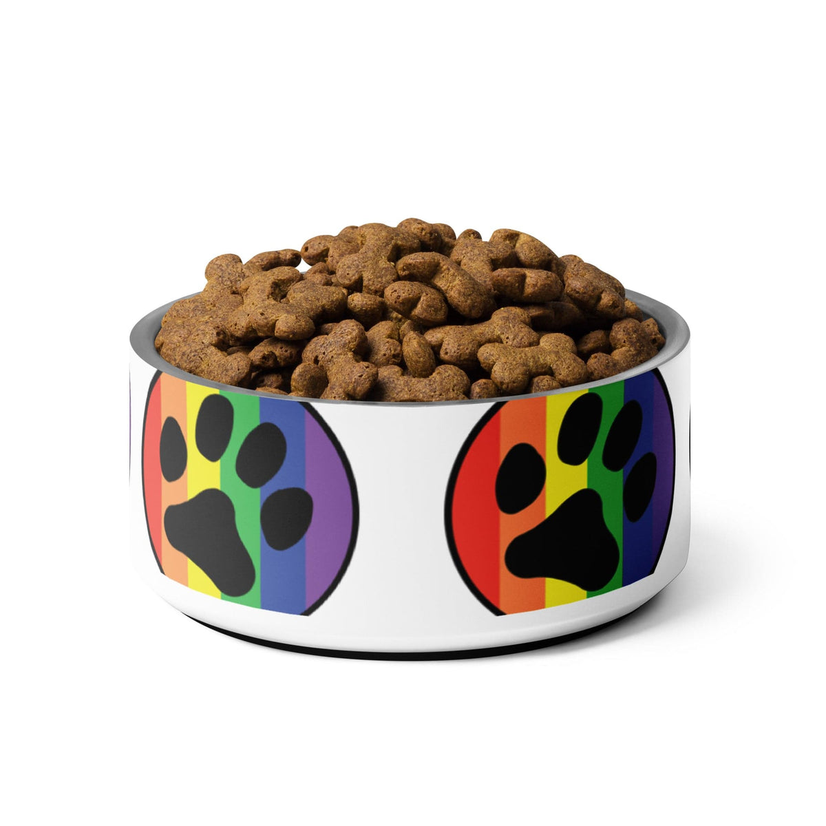 Rainbow paw print pet bowl filled with brown kibble, side view