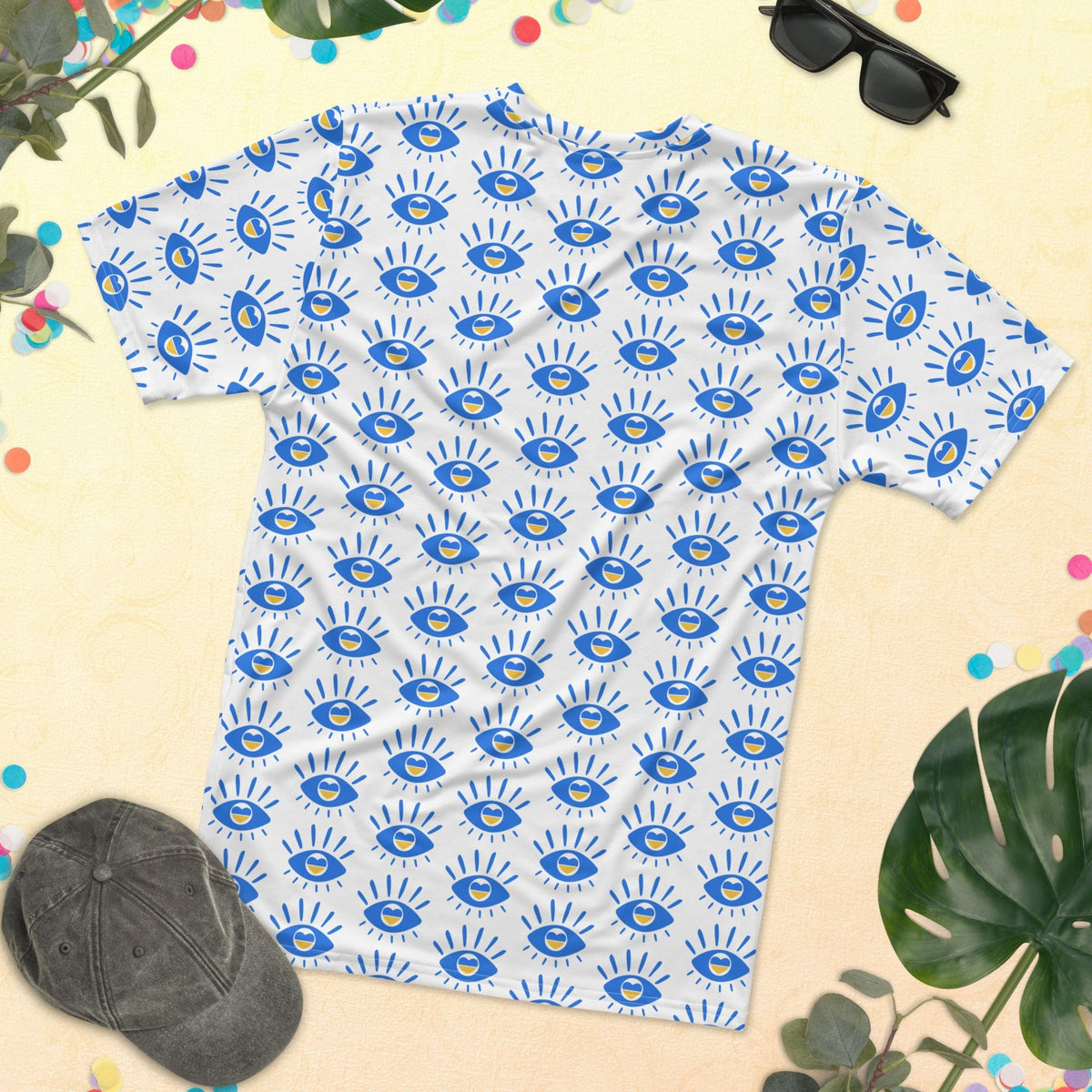 Men's t-shirt laid flat with white fabric and blue eye print, short sleeves, crew neck