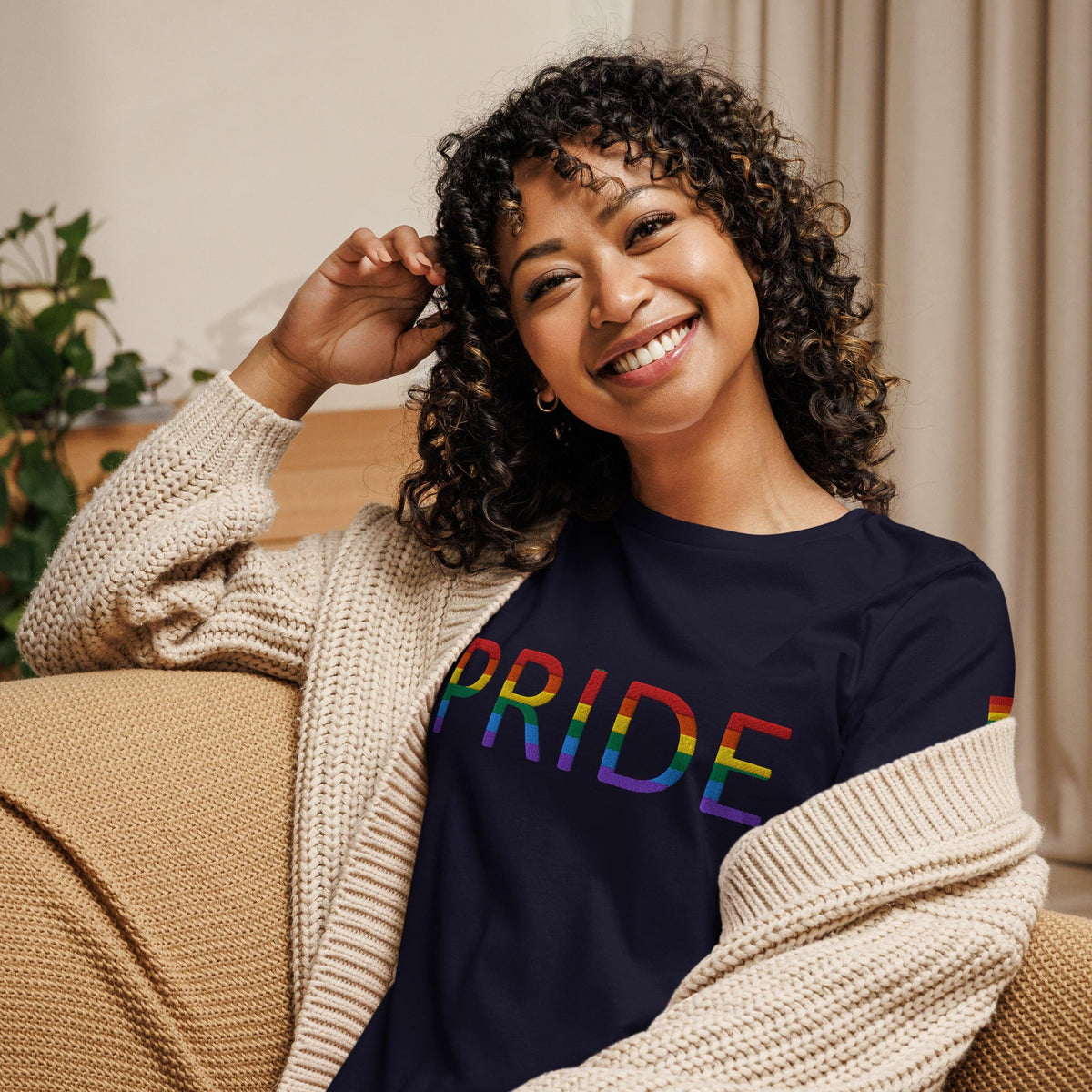 Women’s relaxed t-shirt, navy with rainbow PRIDE text graphic