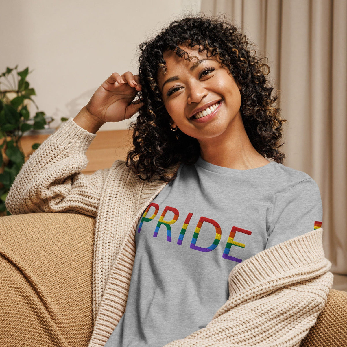 Women’s relaxed t-shirt, light gray with rainbow PRIDE text graphic