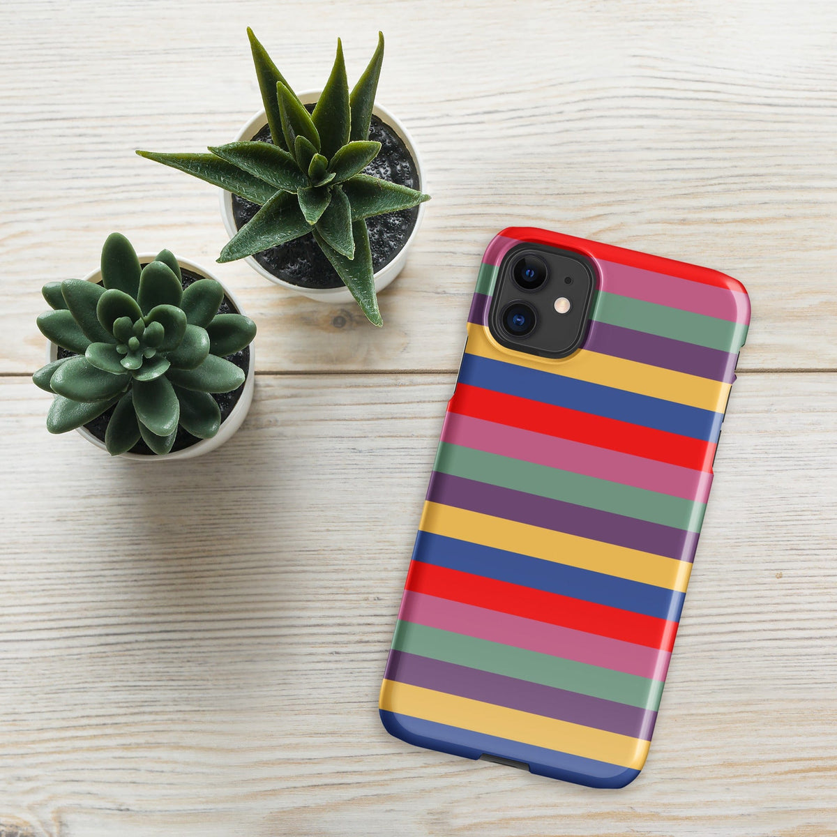 iPhone snap case with horizontal stripes in purple, red, yellow, and blue