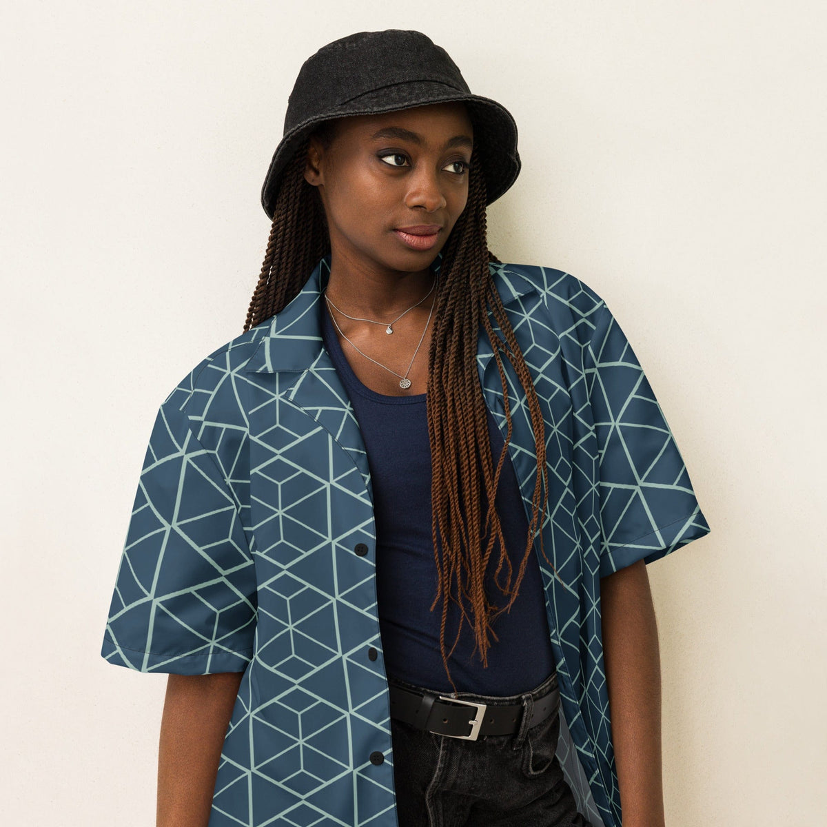 Dark teal geometric cube print short-sleeve button-up shirt with camp collar