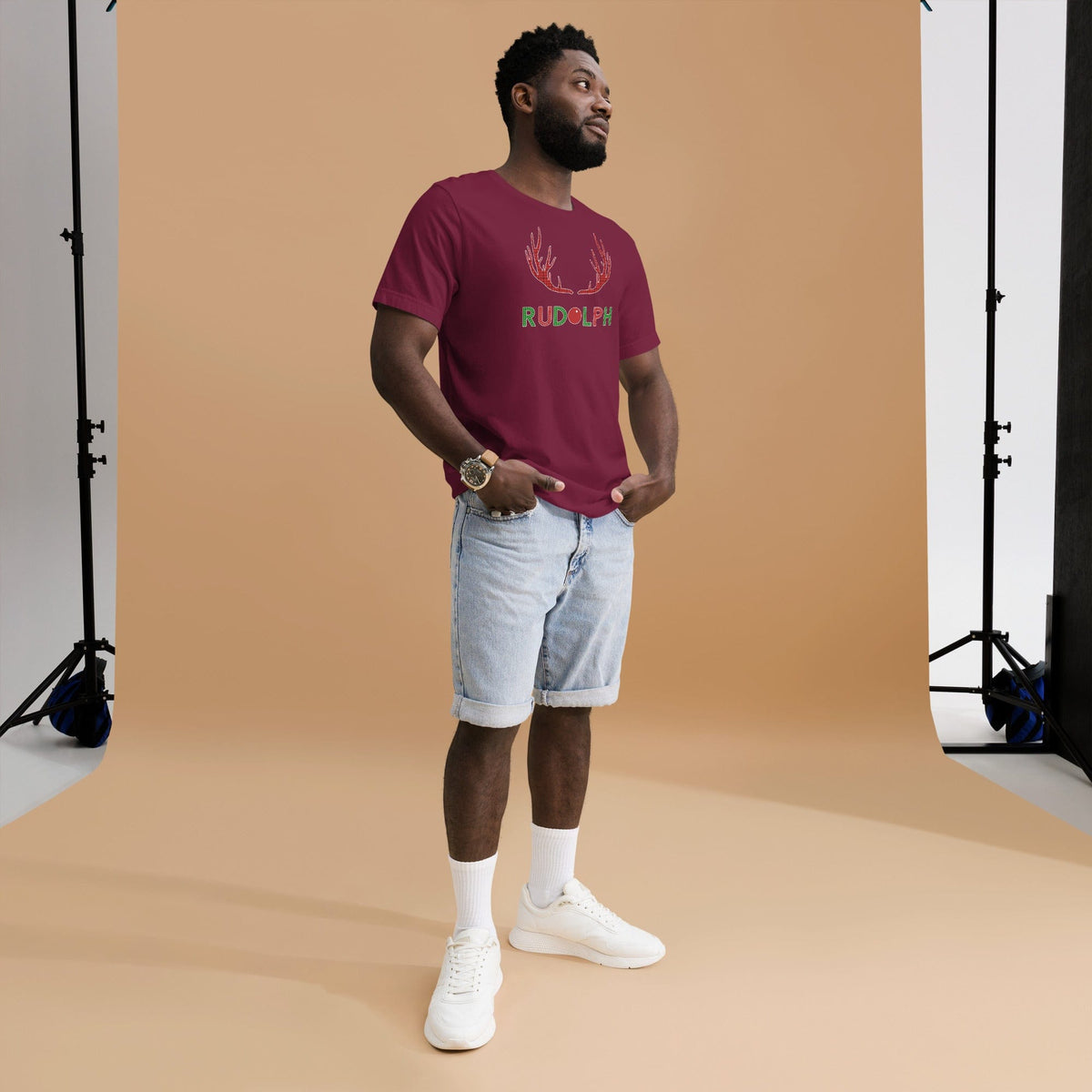 Maroon T-shirt with red reindeer antlers and 'RUDOLPH' lettering