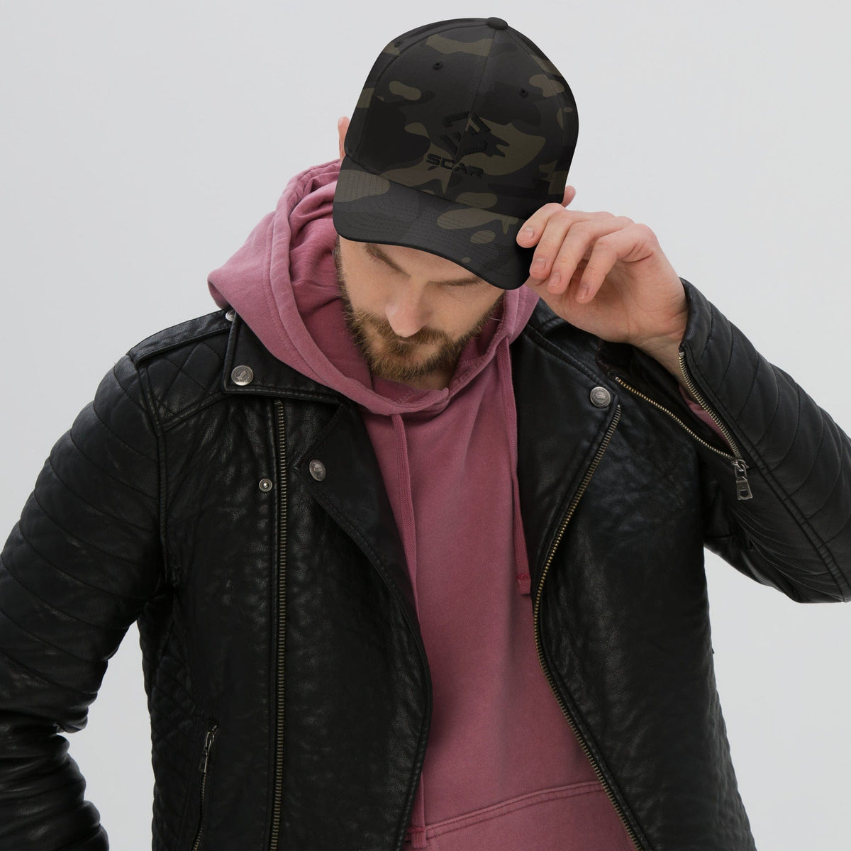 Army camo baseball cap with curved brim and small front logo detail
