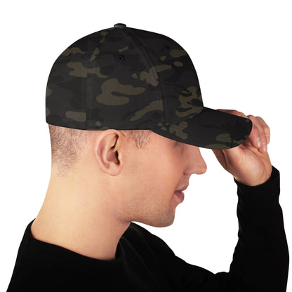 Army camo baseball cap on model, showing side panel and curved brim