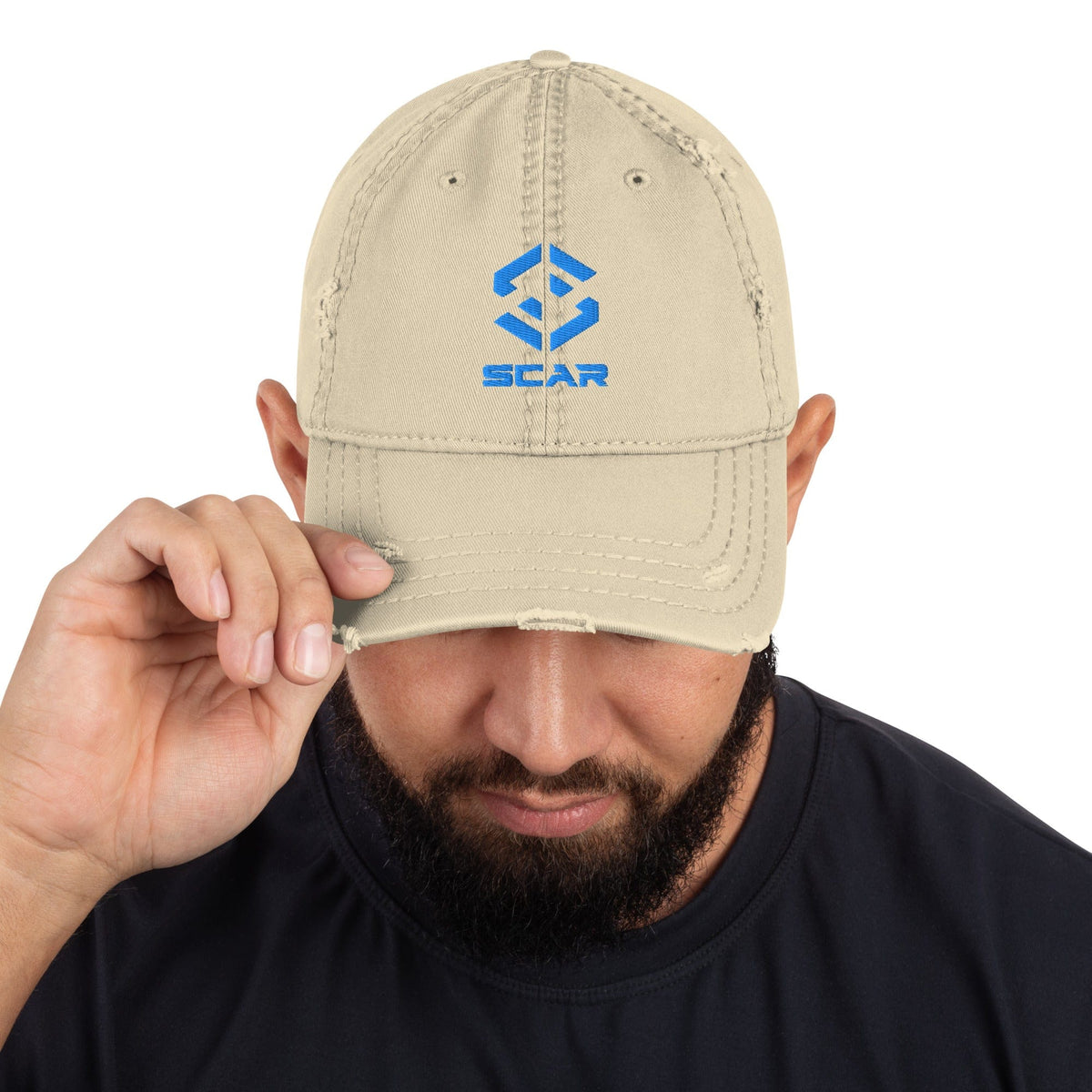 Distressed dad hat with embroidered SCAR logo, khaki, front view