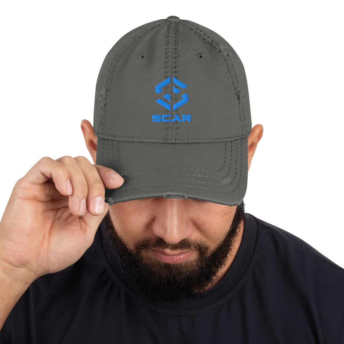Distressed dad hat in charcoal grey with embroidered SCAR logo on the front