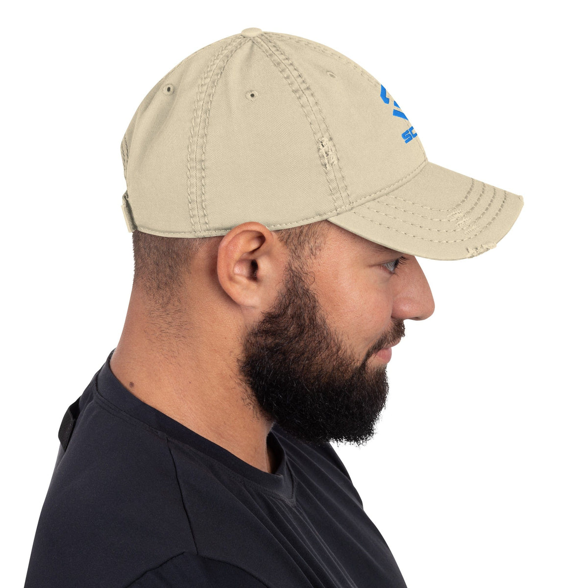 Distressed dad hat in khaki with curved brim and stitched side panels