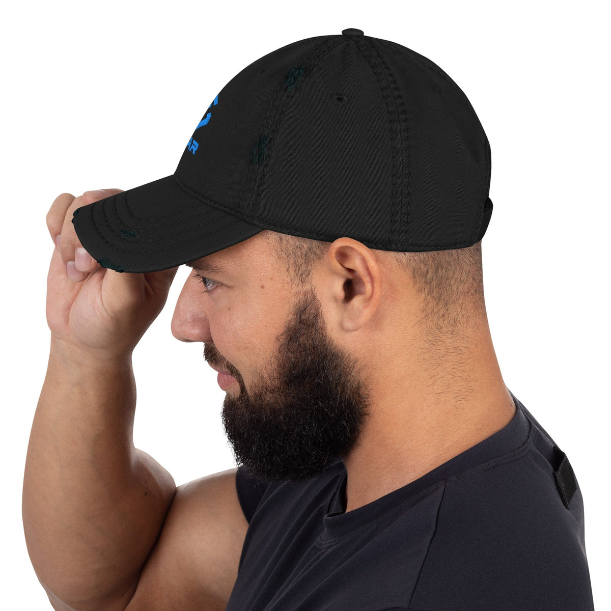 Distressed dad hat with embroidered SCAR logo, black, model wearing side view