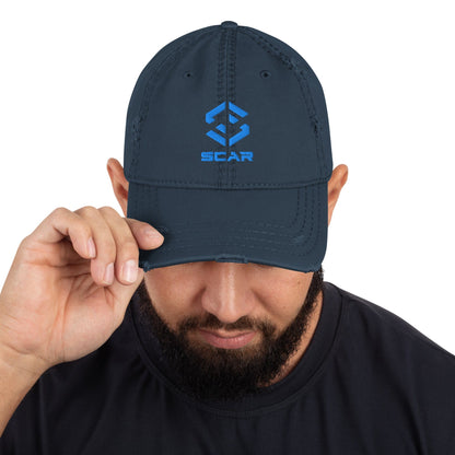 Distressed dad hat in navy with embroidered SCAR logo on the front