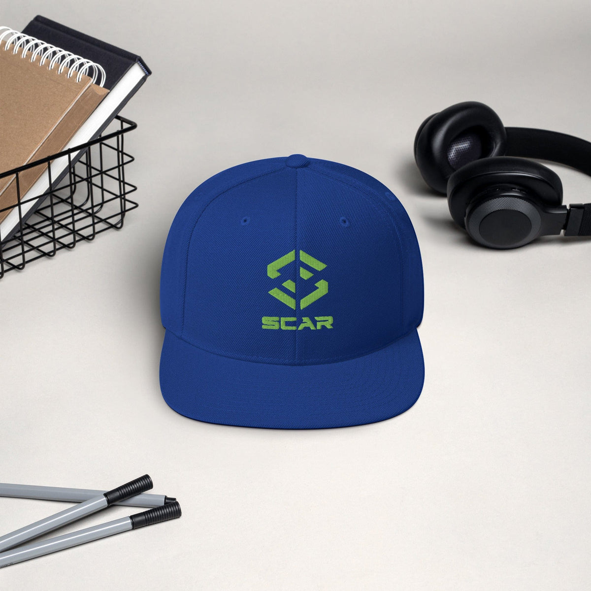 Logo snapback hat in royal blue with embroidered SCAR graphic on the front panel