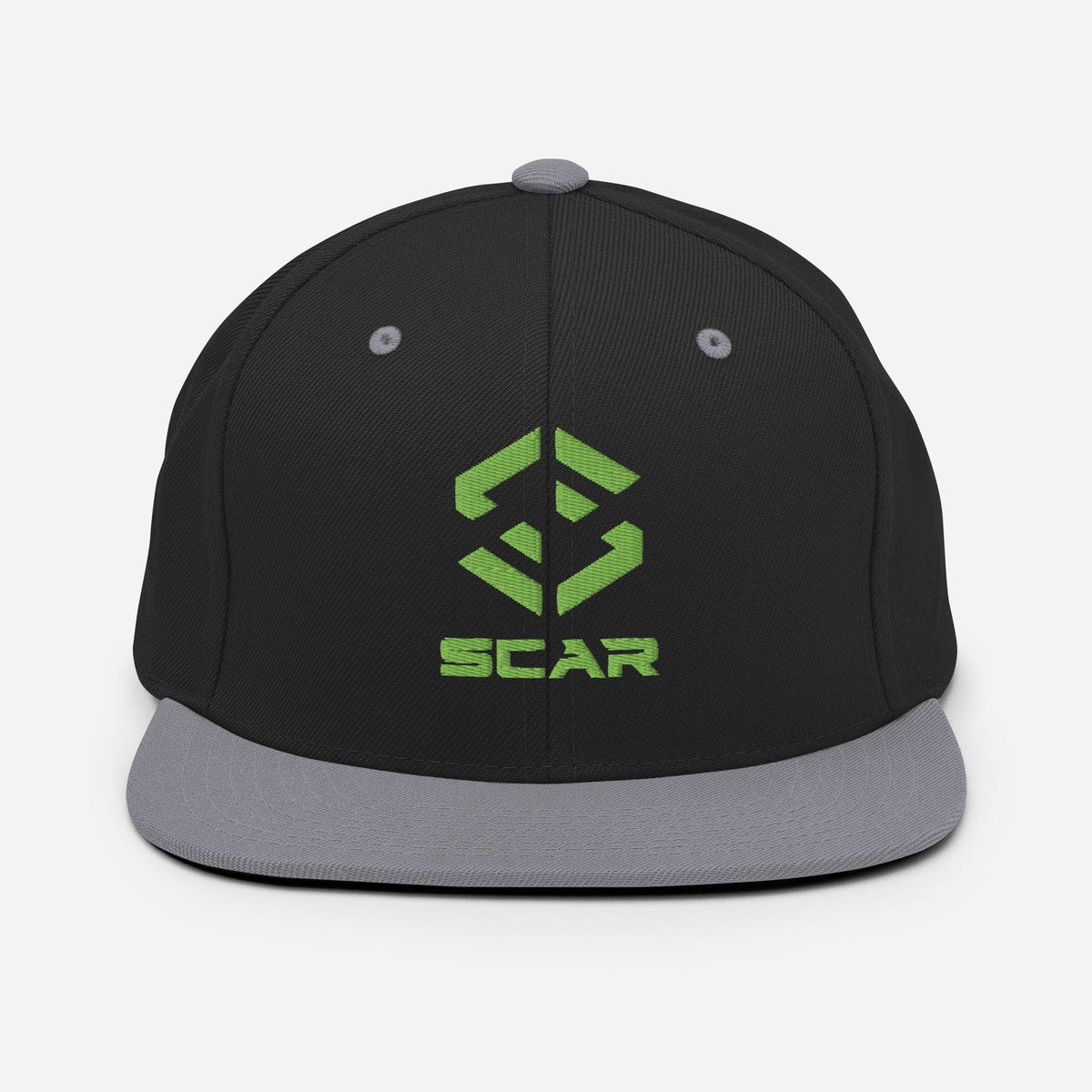 Black snapback hat with gray brim and green SCAR logo embroidery on the front.