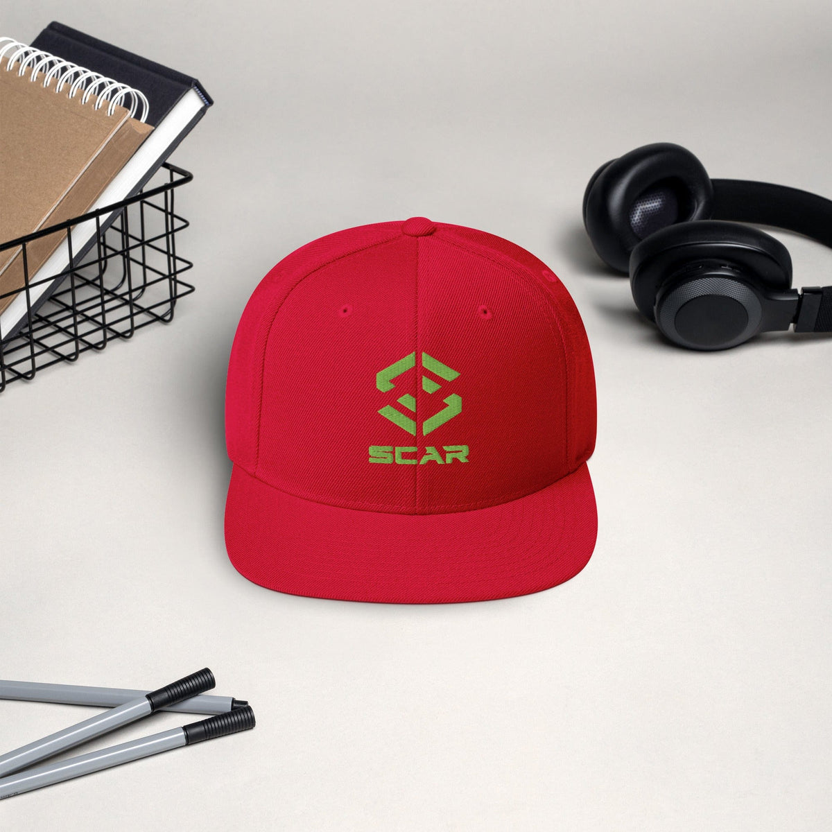 Logo snapback hat in red with embroidered SCAR graphic on the front panel