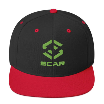 Black and red snapback cap with green embroidered logo and red accent eyelets