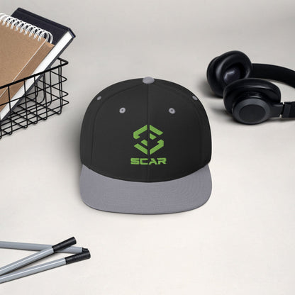 Logo snapback hat in dark charcoal with heather gray brim and embroidered SCAR graphic