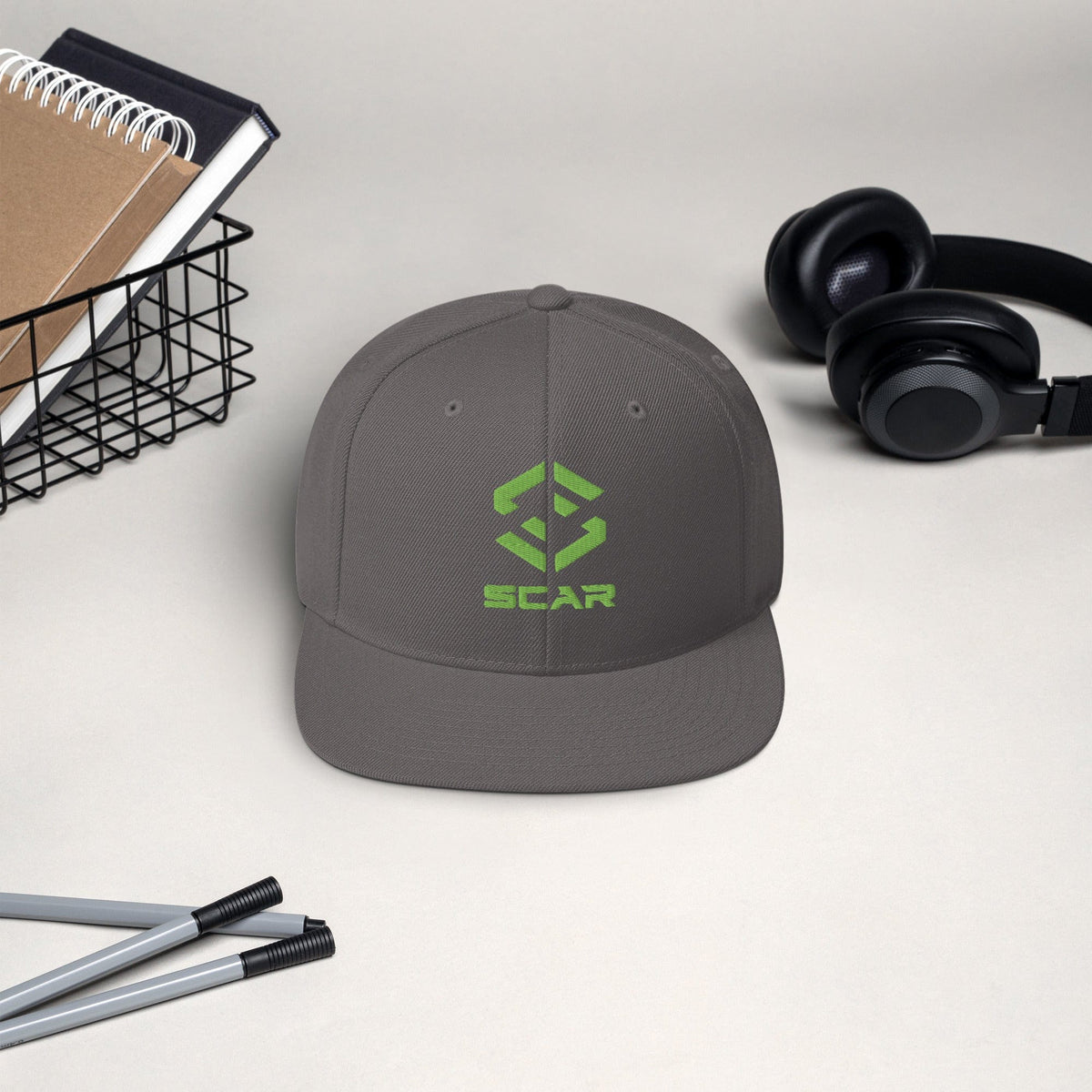 Logo snapback hat in dark gray with embroidered SCAR graphic on the front panel