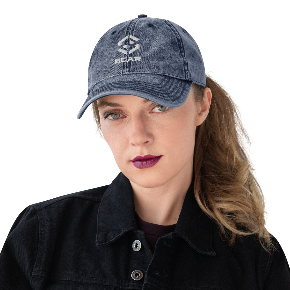 Navy vintage cotton twill cap with embroidered STAR logo, worn by a model