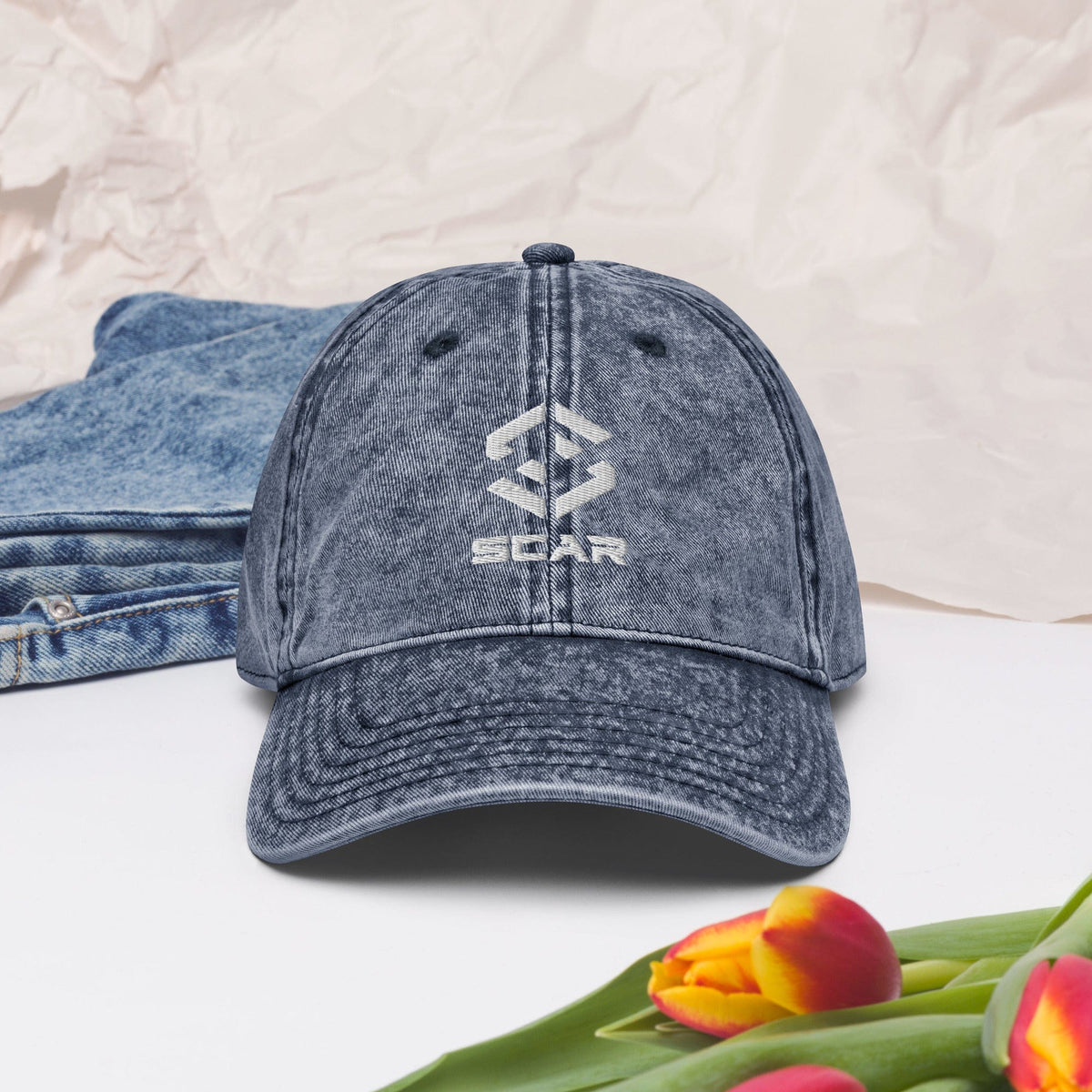 Navy vintage cotton twill cap with embroidered STAR logo on the front panel
