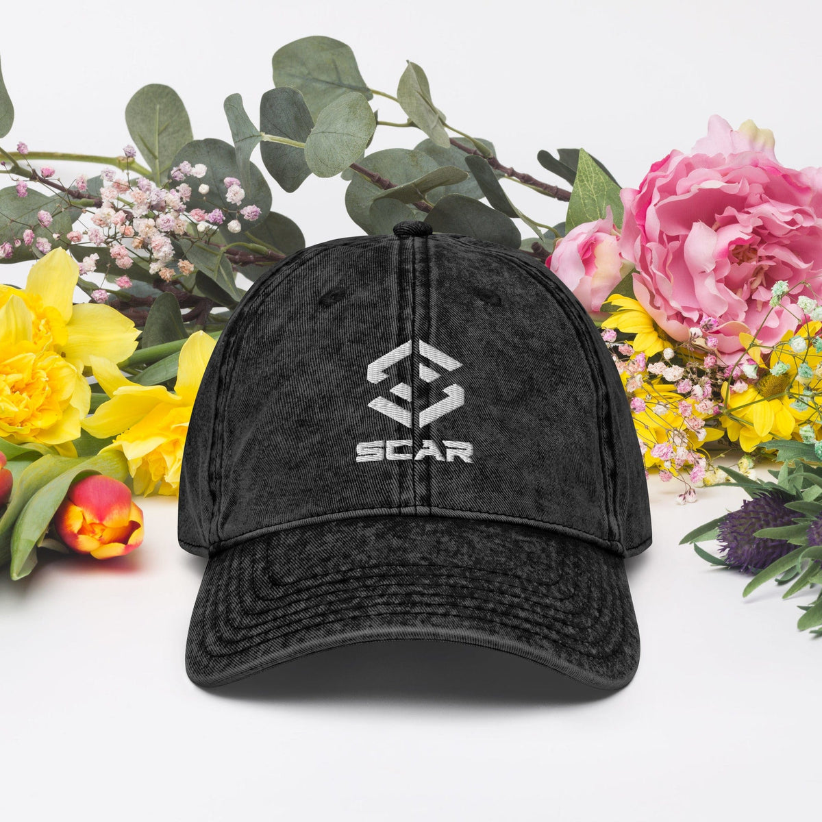 Black vintage cotton twill cap with embroidered STAR logo centered on the front