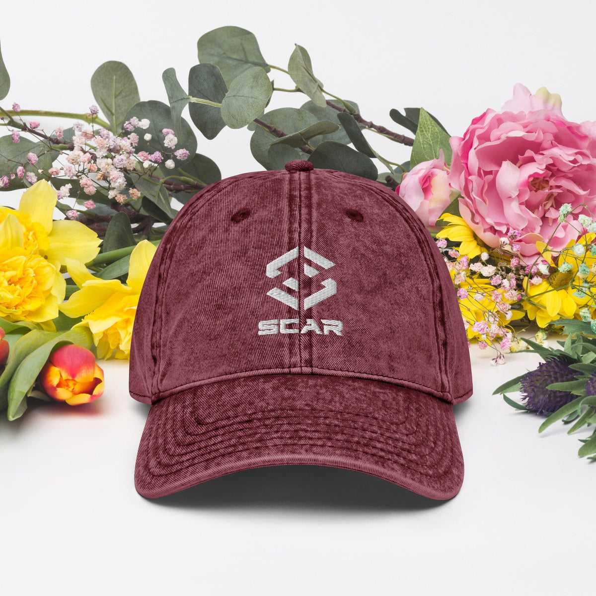 Maroon vintage cotton twill cap with embroidered STAR logo centered on the front