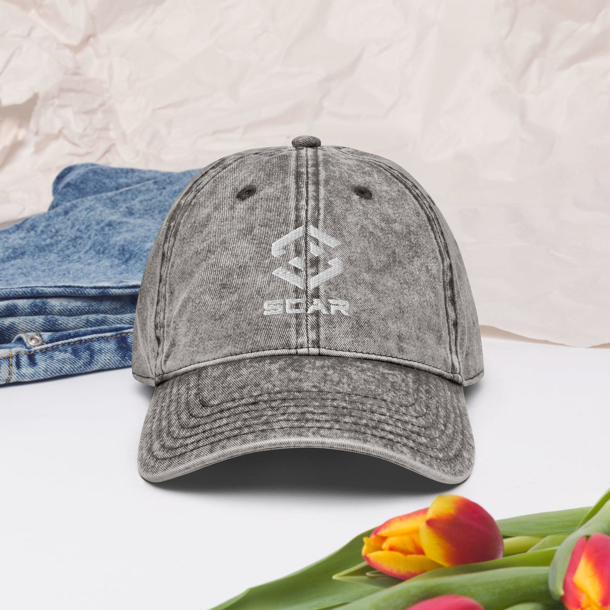 Charcoal grey vintage cotton twill cap with embroidered logo and curved brim