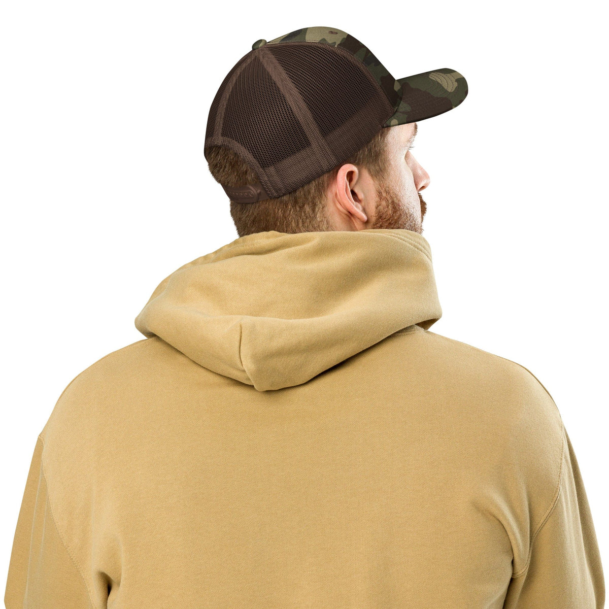 Camouflage trucker cap with black mesh back viewed from the back