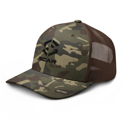 Camouflage trucker hat with embroidered scar logo, dark mesh side panels and curved brim