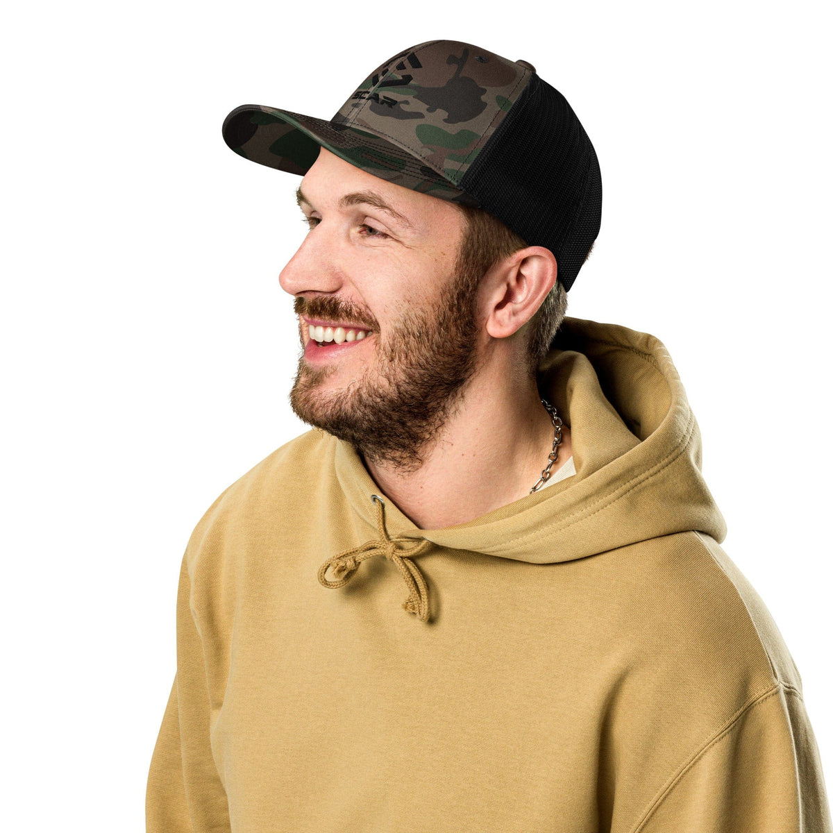 Camouflage trucker cap on a man, mesh back and curved brim in dark camo