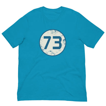 Aqua T-shirt with circular “73” graphic on the chest.