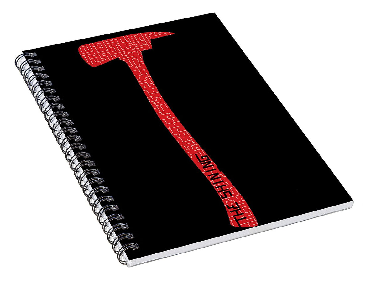 Spiral notebook with black cover and red maze-style vertical design
